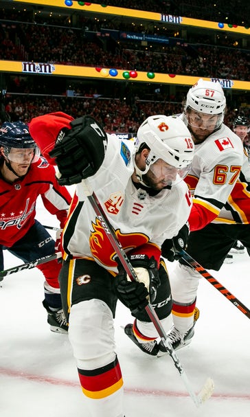 Vrana gets 1st career hat trick, Capitals beat Flames 4-2